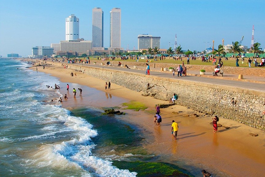 kids playing in the galle face green beach